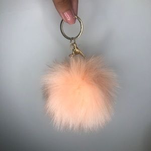 pink and gold puff ball keychain
